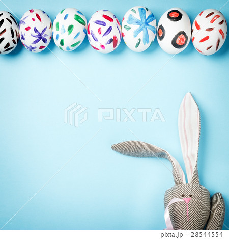 Easter bunny on a blue background Easter bunny on a blue background 28544554