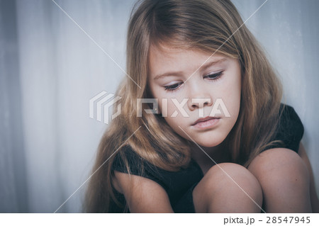 Portrait of sad little girl Portrait of sad little girl 28547945