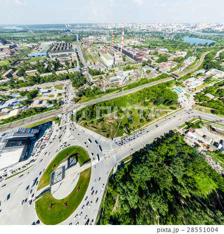 Aerial city view with roads, houses and buildings. Aerial city view with roads, houses and buildings. 28551004