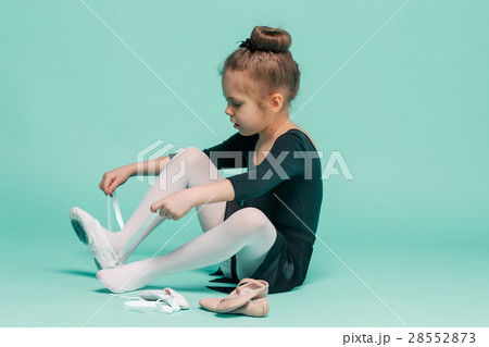 Beautiful little ballerina in black dress for 28552873