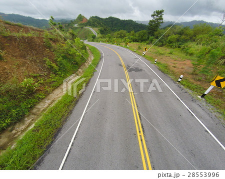 Aerial view of crooked path of road on mountain. Aerial view of crooked path of road on mountain. 28553996