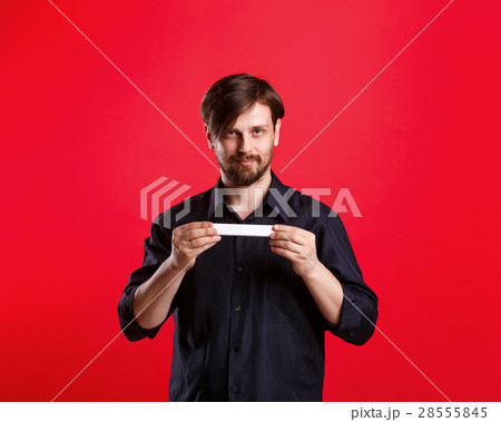 Man holding an empty copyspace Man holding an empty copyspace 28555845