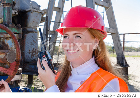 Woman in the oilfield Woman in the oilfield 28556572
