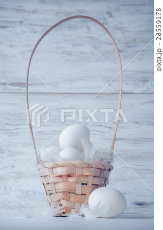 easter eggs in basket easter eggs in basket 28559178
