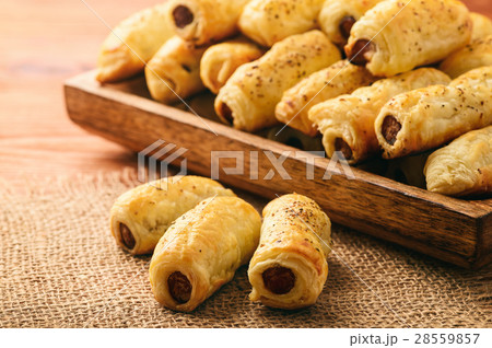 Puff pastry sausage rolls. 28559857