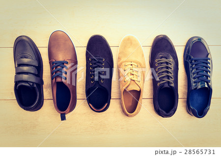 Leather shoes on wooden background Leather shoes on wooden background 28565731
