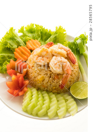 Fried rice with shrimp and prawn on top in white plate Fried rice with shrimp and prawn on top in white plate 28565795
