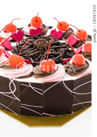 Chocolate cake with cherry on top 28567933