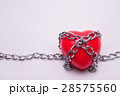 A heart tied with chains on white background. 28575560