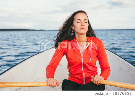 amazing beautiful haired girl swims on a wooden 28576659