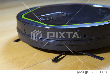 robot the vacuum cleaner cleans a floor, a fragmen 28581424