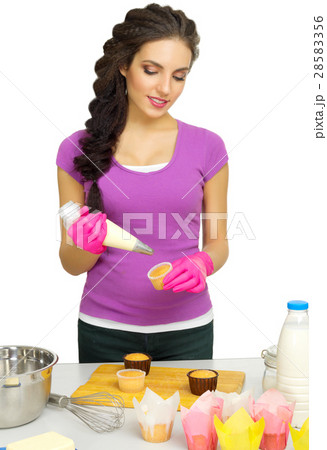 Young woman the chef prepares food 28583356