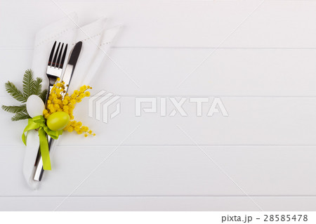 Easter dinner table setting Easter dinner table setting 28585478