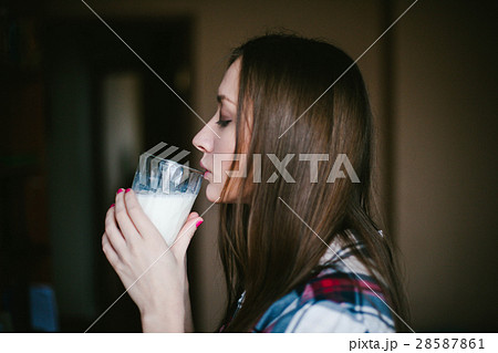 Girl drinks milk Girl drinks milk 28587861
