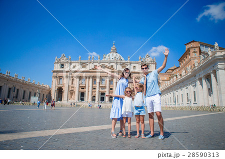 Happy family at St. Peter's Basilica church in 28590313