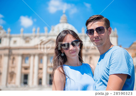 Happy couple at St. Peter's Basilica church in Happy couple at St. Peter's Basilica church in 28590323