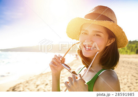 young woman enjoy summer vacation on the beach young woman enjoy summer vacation on the beach 28591985
