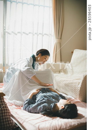 woman during pregnancy or shortly after childbirth 28596403