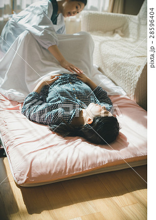 woman during pregnancy or shortly after childbirth 28596404