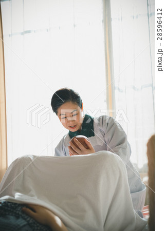 woman during pregnancy or shortly after childbirth 28596412