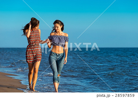 Pretty girl has a fun with her girlfriend on the 28597859