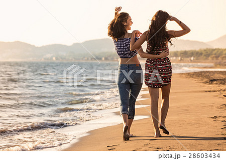 Pretty girl has a fun with her girlfriend on the 28603434