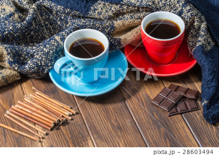 Blanket, chocolate and two cups of coffee 28603494