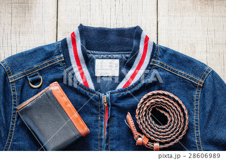 Shirt of blue jeans on wooden. 28606989
