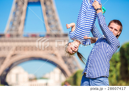 Happy family in Paris background Eiffel Tower on 28607417