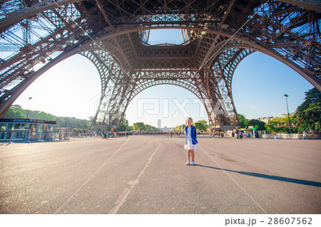 Adorable little girl in Paris under the Eiffel Adorable little girl in Paris under the Eiffel 28607562