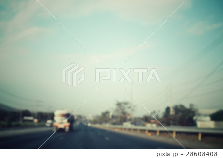 Blurred of car on road 28608408