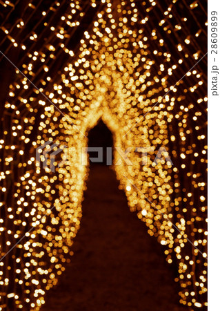 Look at long path leading under the arch of yellow 28609899