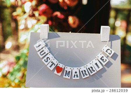 Cards with lettering Just Married hang on roof ????? 28612