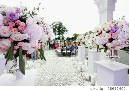 Look from behind large bouquet of roses Look from behind large bouquet of roses 28612402