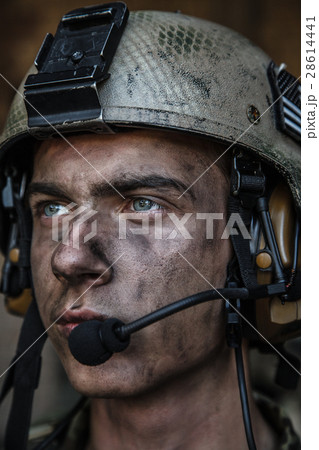 Bright eyes of young soldier 28614441