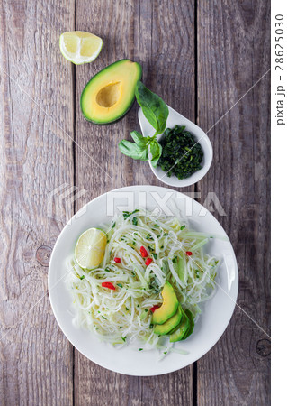 Spicy kohlrabi noodles on a table Spicy kohlrabi noodles on a table 28625030