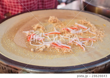 Freshly made Crepe on a hot plate. 28626643