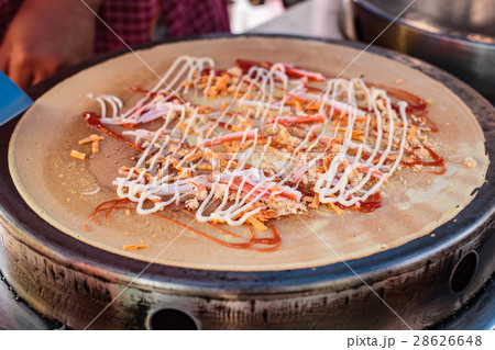 Freshly made Crepe on a hot plate. 28626648