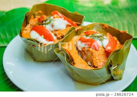 Steamed fish with curry paste. Steamed fish with curry paste. 28626724