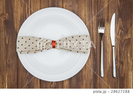 dinner setting, Knife, fork, napkin and dinner dinner setting, Knife, fork, napkin and dinner 28627288