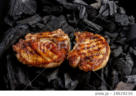 Grilled meat on the coals background Grilled meat on the coals background 28628230