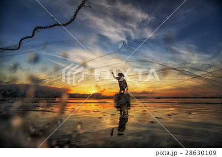 Fisherman of Bangpra Lake 28630109