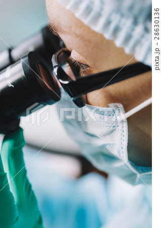 Close up view of scientist eye 28630136
