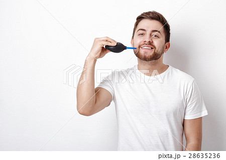 photographer holding camera cleaning vacuum pump photographer holding camera cleaning vacuum pump 28635236
