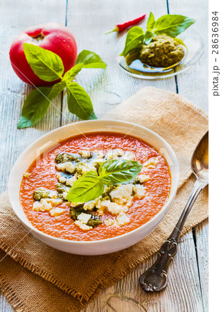 Tomato cream soup with feta cheese and pesto sauce Tomato cream soup with feta cheese and pesto sauce 28636984