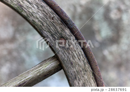 A fragment of a wooden wagon wheels A fragment of a wooden wagon wheels 28637691