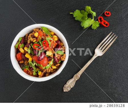 Chili con carne in a white ceramic bowl 28639128