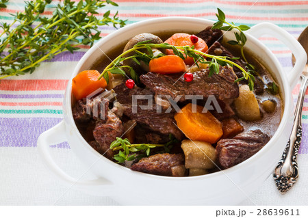 Beef Bourguignon in a white soup bowl 28639611