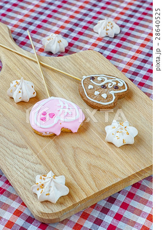 Sweet white meringue and oatmeal cookies in the form of hearts 28640525