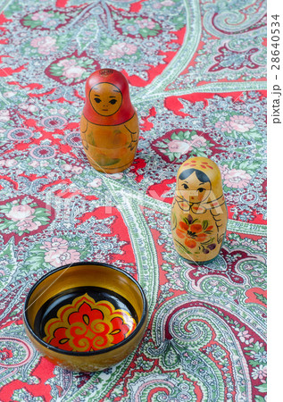 Russian nesting dolls on the traditional handkerchief. Russian nesting dolls on the traditional handkerchief. 28640534